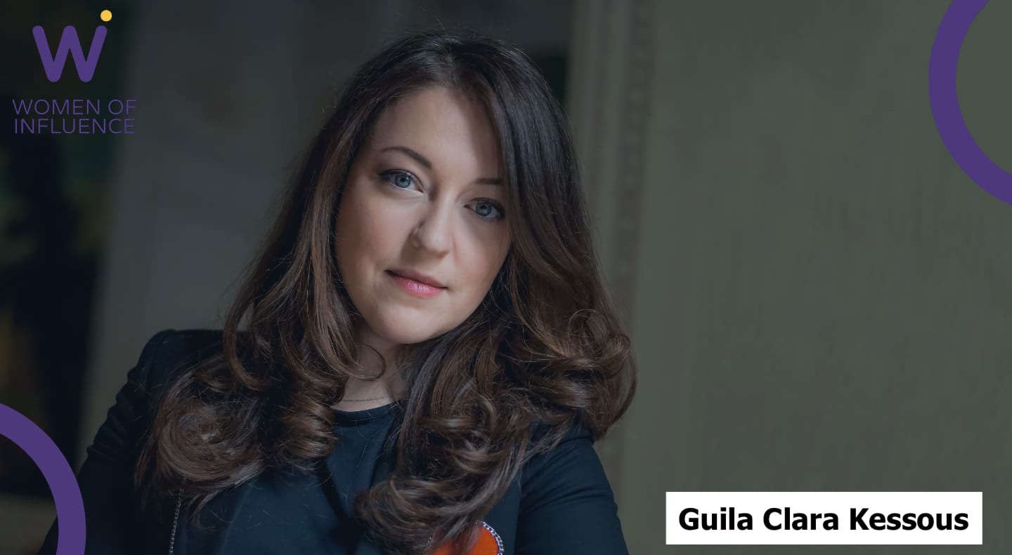 Portrait of Guila Clara Kessous with WoI logo in the lower right corner.