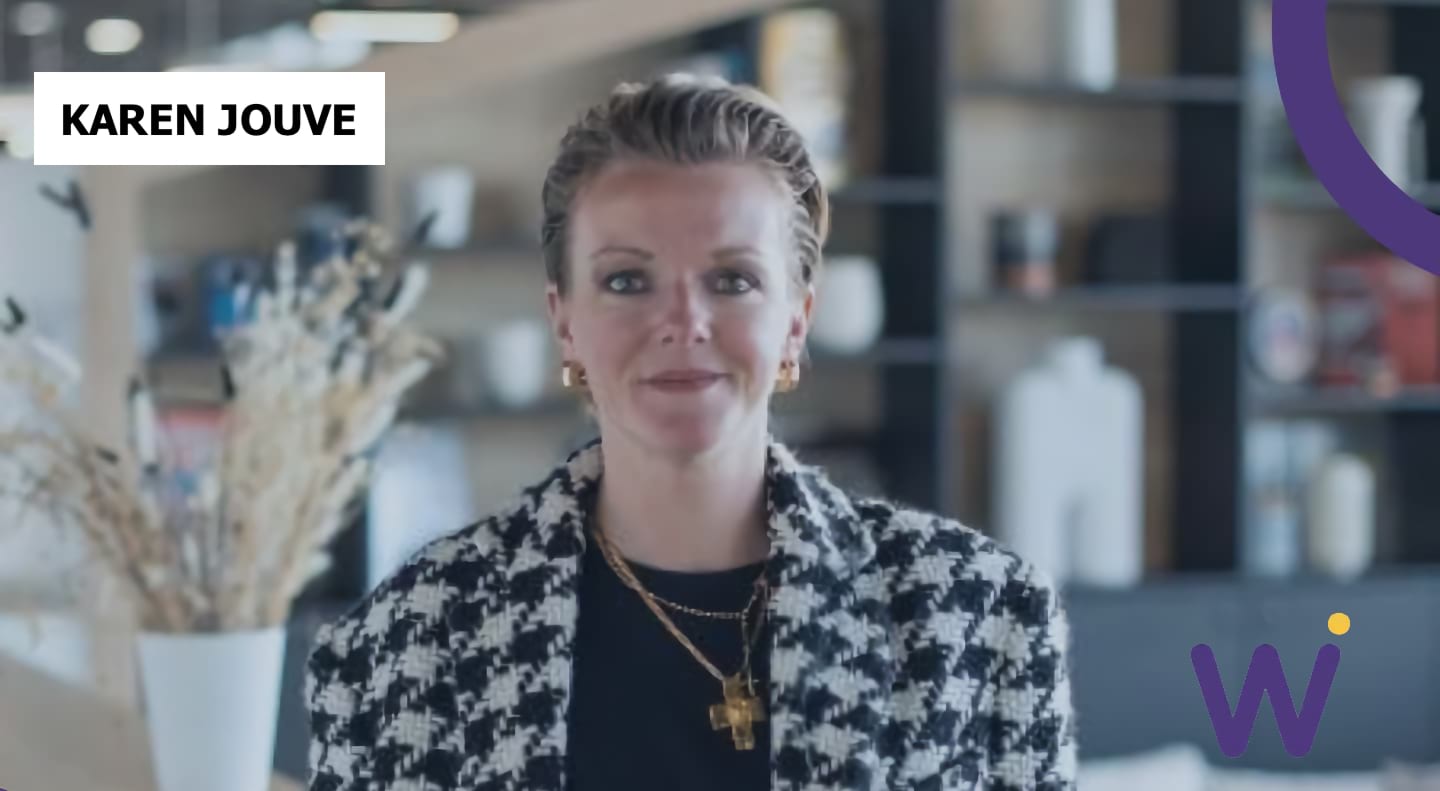 Portrait of Karen Jouve with WoI logo in the lower right corner.