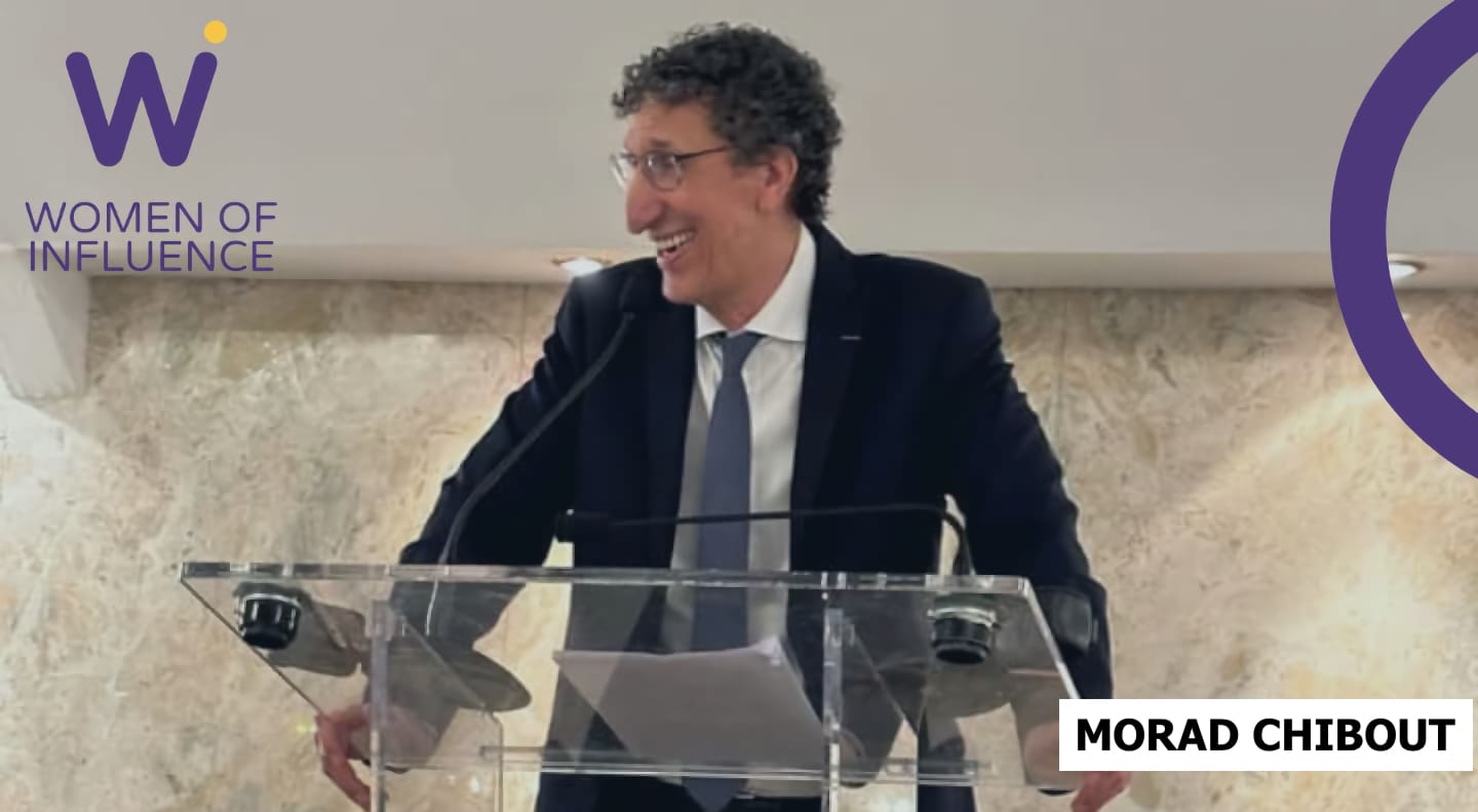 Portrait of Morald Chibout with the WoI logo in the upper left corner.