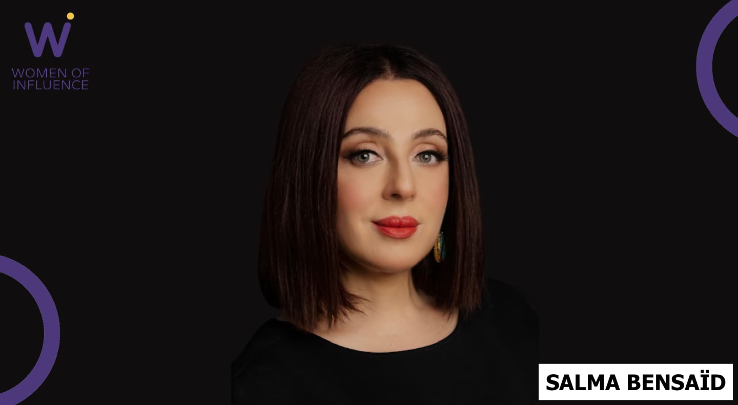 Portrait of Salma Bensaïd with WoI logo in the top left corner.