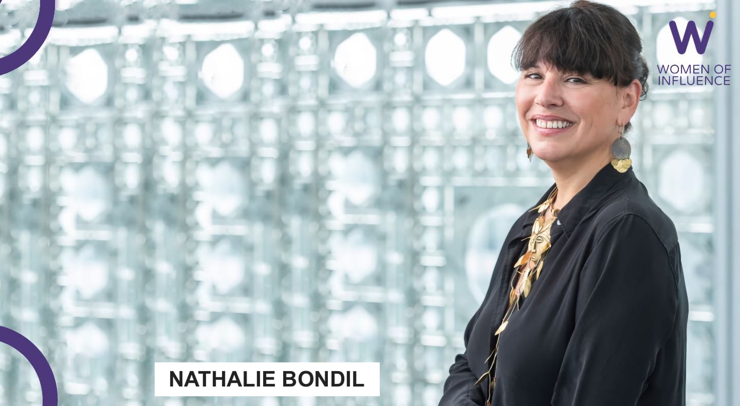 Portrait of Nathalie Bondil with the logo in the top right.